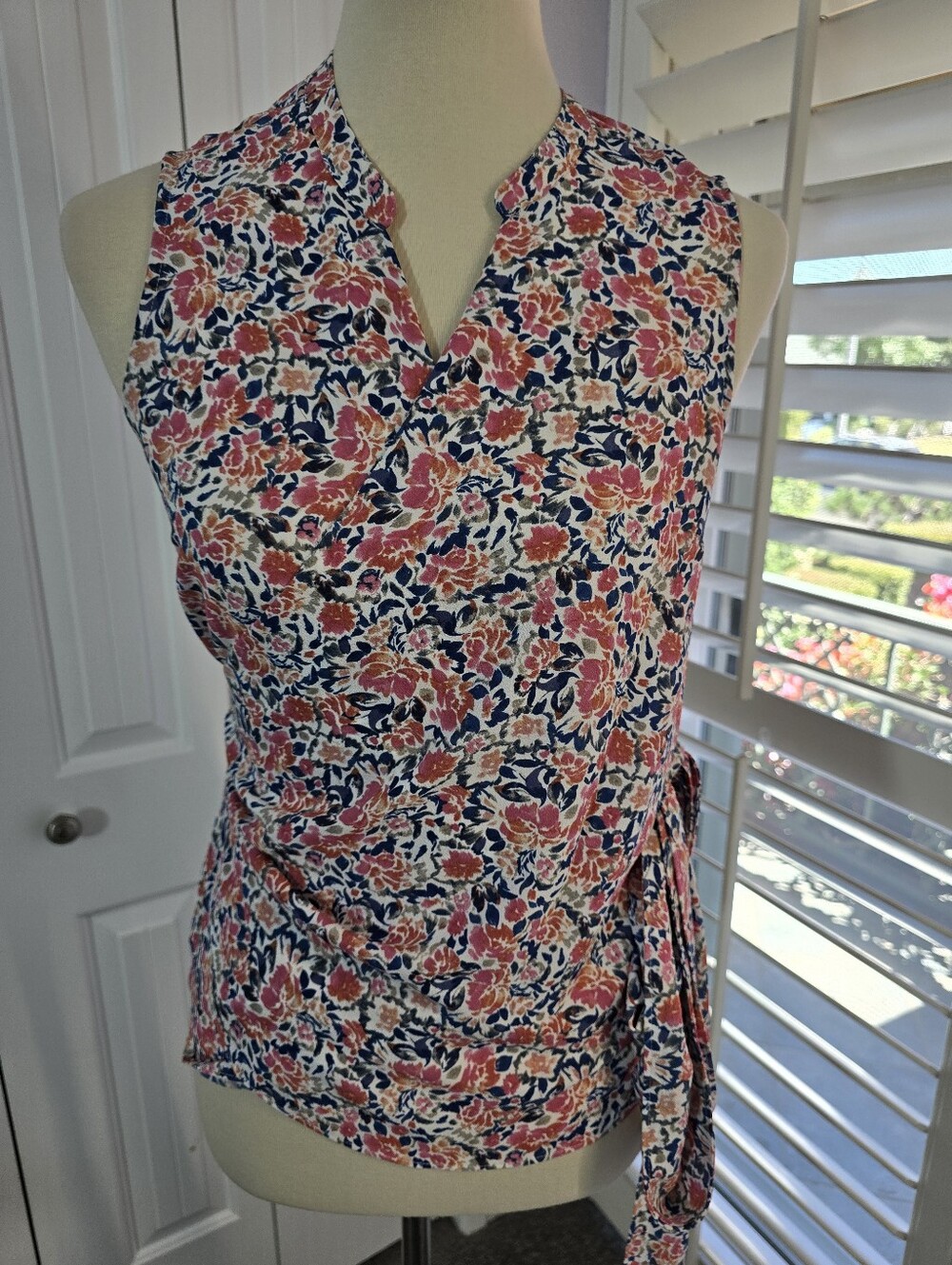 1. State Sleeveless Floral Wrap Top in Coral and Navy